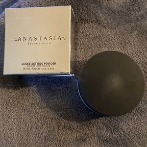 Translucent loose setting powder